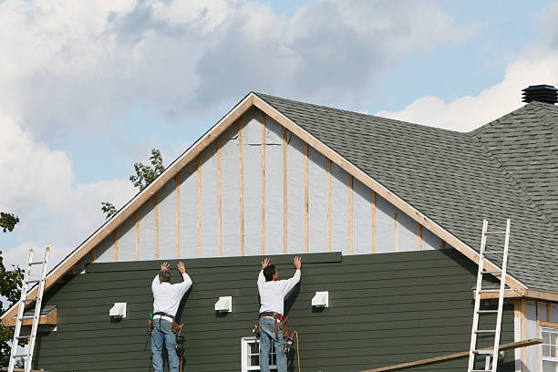 Professional Emergency Siding Repair technician working in Westchester, IL